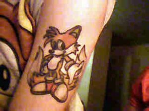 Rating: Safe Score: 0 Tags: 4:3 anthro canid canine e621 fox grandfathered_content human low_res male mammal miles_prower multi_tail real sega solo sonic_the_hedgehog_(series) tail tattoo tattoo_(artwork) unknown_artist User: bunchy7s