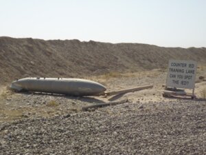 Rating: Safe Score: 0 Tags: 4:3 absurd_res beam_(structure) branch camo challenge defeatdown desert dirt e621 english_text fuel_tank grandfathered_content grass hi_res improvised_explosive_device iraq iraq_war mixed_media not_furry outside photo_background photography_(artwork) plant public real rock sandbag sign sky text what wood zero_pictured User: bunchy7s