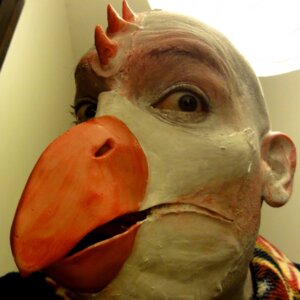 Rating: Safe Score: 0 Tags: 1:1 avian bird clothing costume e621 grandfathered_content hi_res makeup male mask photography_(artwork) real solo uncanny_valley unknown_artist User: bunchy7s