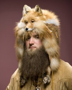 Rating: Safe Score: 0 Tags: 4:5 beard canid canine clothing dave_mead duo e621 facial_hair feral fox grandfathered_content hat hatter headgear headwear human jewelry leather looking_at_viewer male mammal necklace photography_(artwork) real simple_background trapper User: bunchy7s
