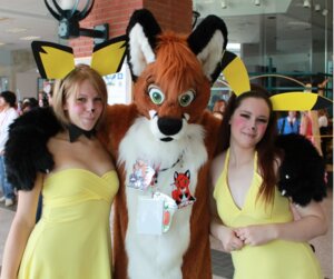 Rating: Safe Score: 0 Tags: anthro blonde_hair brown_hair canid canine clothing convention cosplay costume e621 female fox fur fursuit generation_1_pokemon generation_2_pokemon grandfathered_content green_eyes group hair human long_hair looking_at_viewer lucifur_(artist) makeup male mammal nintendo pichu pikachu pokemon pokemon_(species) real rodent smile yellow_body yellow_fur User: bunchy7s