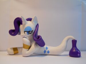 Rating: Safe Score: 0 Tags: 2013 4:3 absurd_res alternate_species blue_eyes bottle bracelet clay_(artwork) container cutie_mark e621 equid equine female friendship_is_magic genie gold_(metal) hair half-closed_eyes hasbro hi_res hoikarnage horn jewelry lying mammal my_little_pony mythological_creature mythological_equine mythology narrowed_eyes pose purple_hair rarity_(mlp) sculpture_(artwork) simple_background solo traditional_media_(artwork) unicorn User: bunchy7s
