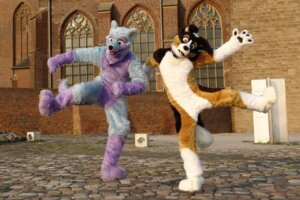 Rating: Safe Score: 0 Tags: 2010 acesheperd anthro brown_eyes canid canine canis clothing collar costume domestic_dog duo e621 fursuit grandfathered_content happy jumping looking_at_viewer male mammal paws photography_(artwork) real stripes tail User: bunchy7s