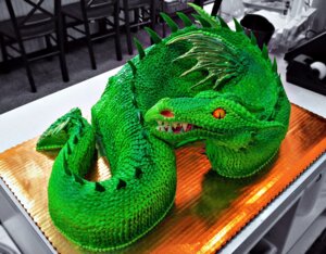 Rating: Safe Score: 0 Tags: ambiguous_gender cake chair dessert dragon e621 feral food furniture grandfathered_content green_body green_scales horn mythological_creature mythological_scalie mythology photography_(artwork) real scales scalie solo spines tail tape teeth the-evil-plankton wings User: bunchy7s