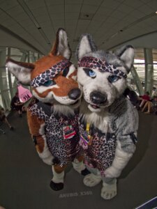 Rating: Safe Score: 0 Tags: 2010 3:4 anthro anubis_x360 blue_eyes canid canine canis clothing costume domestic_dog duo_focus e621 ear_piercing ear_tag fursuit grandfathered_content group hi_res huskers husky junowolf kerchief male mammal married name_tag nordic_sled_dog photography_(artwork) piercing real spitz wolf User: bunchy7s