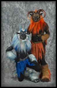 Rating: Safe Score: 0 Tags: anthro black_border blue_body blue_fur border clothing costume dragon duo e621 fangs fur fursuit grandfathered_content horn looking_at_viewer male mythological_creature mythological_scalie mythology orange_body orange_fur qarrezel real scalie skrink skrod teeth User: bunchy7s