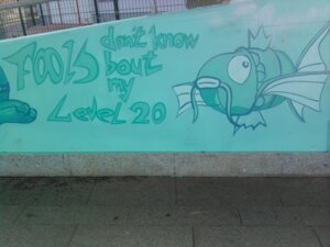 Rating: Safe Score: 0 Tags: 4:3 ambiguous_gender dirt duo e621 english_text fence feral generation_1_pokemon graffiti grandfathered_content hi_res magikarp nintendo photo picture_in_picture pokemon pokemon_(species) real text unknown_artist zero_pictured User: bunchy7s
