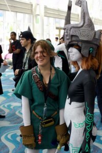 Rating: Safe Score: 0 Tags: clothing cosplay crossgender duo_focus e621 female fused_shadow grandfathered_content group headgear headwear human humanoid hylian link mammal midna nintendo not_furry real the_legend_of_zelda twili twilight_princess unknown_artist User: bunchy7s