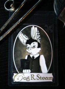Rating: Safe Score: 0 Tags: anthro black_body black_fur black_hair character_badge_(artwork) classy clothed clothing e621 ear_piercing eyewear front_view fur glasses grandfathered_content hair hat headgear headwear holding_clothing holding_hat holding_headgear holding_headwear holding_object jacent lagomorph leporid long_ears male mammal piercing rabbit short_hair simple_background solo top_hat victoriana white_body white_fur User: bunchy7s