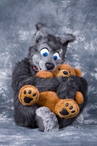 Rating: Safe Score: 0 Tags: ambiguous_gender anthro biped blue_eyes canid canine canis clothing collar costume cuddling domestic_dog e621 fursuit grandfathered_content heart_symbol looking_at_viewer mammal photo plushie real sitting solo teddy_bear wolly User: bunchy7s