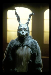 Rating: Safe Score: 0 Tags: anthro biped bone clothing costume creepy donnie_darko e621 frank_the_rabbit fur fursuit grandfathered_content grey_body grey_fur lagomorph leporid looking_at_viewer male mammal mask official_art rabbit real screencap skull solo standing teeth unknown_artist User: bunchy7s