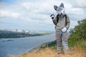 Rating: Safe Score: 0 Tags: 2010 anthro archived_source avallah_(artist) blue_eyes canid canine canis clothing cloud collar costume e621 fursuit gesture grandfathered_content looking_at_viewer male mammal mixed_media nature outside paws photo_background photography_(artwork) real scenery sky solo water waving wolf User: bunchy7s