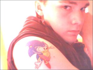 Rating: Safe Score: 0 Tags: 4:3 anthro e621 eulipotyphlan grandfathered_content hedgehog human male male_human mammal photography_(artwork) real sega solo sonic_the_hedgehog sonic_the_hedgehog_(series) tattoo tattoo_(artwork) unknown_artist User: bunchy7s