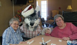 Rating: Safe Score: 0 Tags: 2010 anthro blue_eyes canid canine canis christmas christmas_clothing christmas_headwear clothing costume domestic_dog dominoes e621 elderly electronics female fursuit grandfathered_content grandmother_(lore) grandparent_(lore) group hat headgear headwear holidays human husky male mammal nordic_sled_dog nyappy photography_(artwork) real santa_hat siberian_husky smile spitz television unavailable_at_source unknown_artist User: bunchy7s